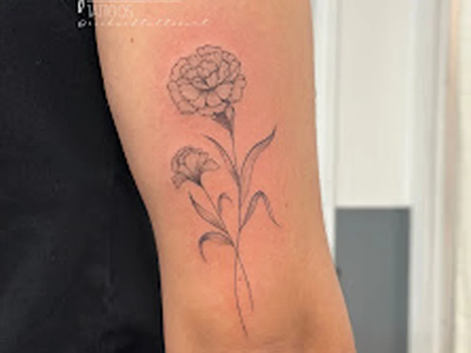 Black Cloud Tattoo and Piercing