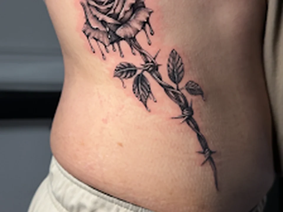 Black Cloud Tattoo and Piercing